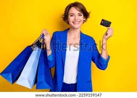 Photo of positive agent business lady hold bags credit card enjoying fashion week weekend isolated bright color background