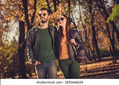 Photo Of Positive Charming, Couple Girl Guy Look Aside In Fall September City Center Park Wear Rucksack