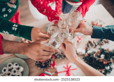 Photo of positive cheerful people colleagues friends new year tradition drink alcohol wine celebrate corporate party indoors - Powered by Shutterstock