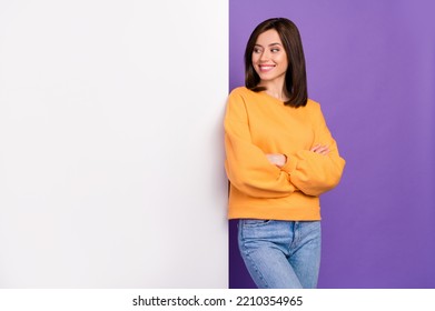Photo of positive dreamy lady dressed stylish autumn sweatshirt interested look big poster empty space isolated on purple color background - Shutterstock ID 2210354965