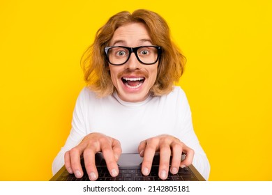 Photo of positive funky guy wear white shirt spectacles chatting modern gadget isolated yellow color background - Shutterstock ID 2142805181