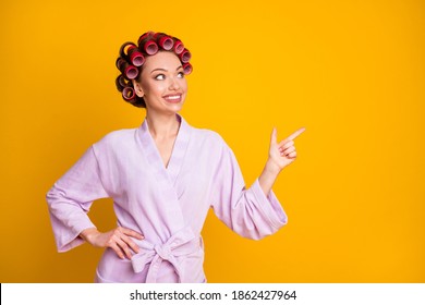 Photo Of Positive Girl Point Index Finger Copyspace Wear Purple Bath Robe Isolated Bright Color Background