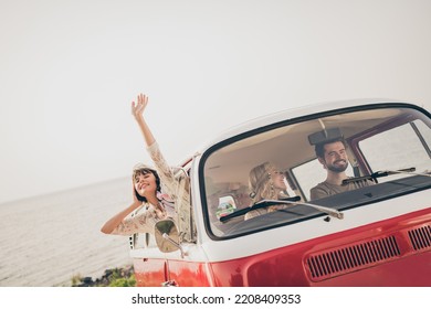 Photo of positive hippie lady ride best fellows seaside tourism trip guy rent minivan driver outdoors - Powered by Shutterstock