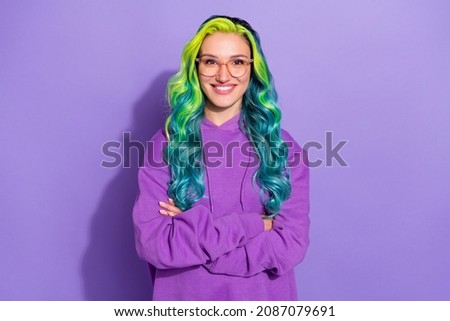 Photo of positive millennial lady with teal turquoise blue haircut cross hands isolated over violet color background