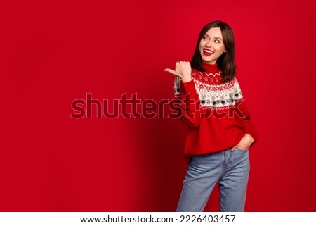 Photo of positive pretty lady look direct thumb finger empty space offer isolated on red color background