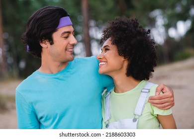 Photo Of Positive Pretty Young Husband Wife Embracing Smiling Enjoying Sunny Weather Outside Seaside Beach