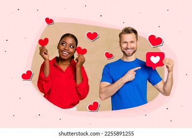 Photo poster positive young couple man directing finger red paper love symbol near girlfriend postcard valentine day isolated beige background
