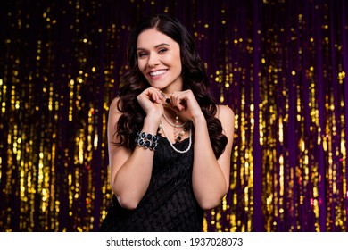 Photo Of Pretty Adorable Young Woman Dressed Black Outfit Arms Chin Smiling Isolated Gold Shine Backdrop Background