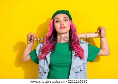 Photo of pretty confident lady wear jeans waistcoat holding beat looking you isolated yellow color background