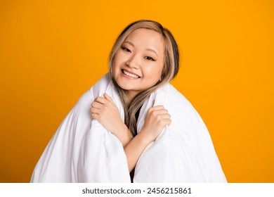 Photo of pretty cute nice woman wrapped warm blanket bedclothes isolated on yellow color background - Powered by Shutterstock