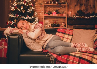 Photo of pretty dreamy young lady dressed print pullover enjoying christmas time smiling indoors room home house - Powered by Shutterstock