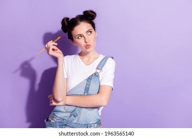 Photo Of Pretty Focused Person Hand Hold Brush Look Interested Empty Space Isolated On Violet Color Background