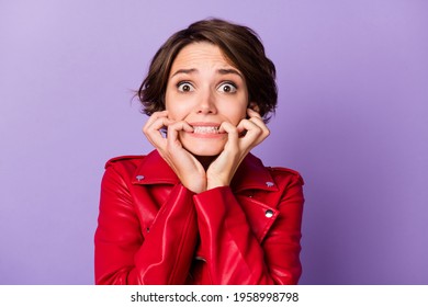 Photo Of Pretty Horrified Lady Biting Finger Nail Staring Worried Camera Isolated On Violet Color Background