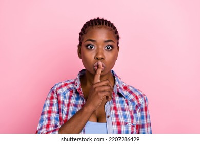 Photo Of Pretty Lady Hand Finger Cover Lips Demonstrate Shh Gesture Isolated On Pink Color Background