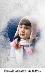 Photo Of Pretty Little Girl Behind Frosted Window Looking Through It