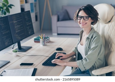 Photo of pretty smiling student girl practicing developing website young system administrator working in office