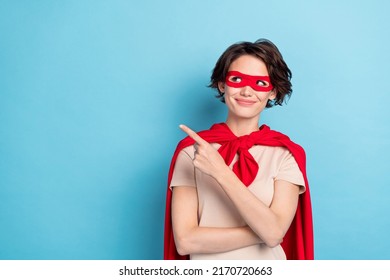 Photo Of Pretty Thoughtful Lady Dressed Red Mantle Looking Pointing Finger Empty Space Isolated Blue Color Background