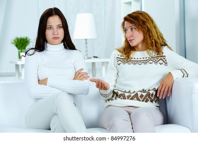 Photo Of Pretty Woman Looking At Her Teenage Daughter During Argument