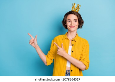 Photo Of Promoter Prom Queen Lady Direct Fingers Empty Space Wear Crown Yellow Shirt Isolated Blue Color Background