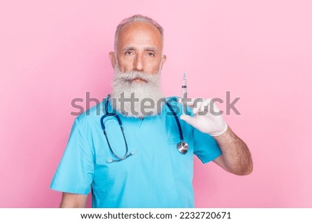 Photo of qualified man doc pediatrician hold syringe vaccine against sars covid 19 isolated pastel color background