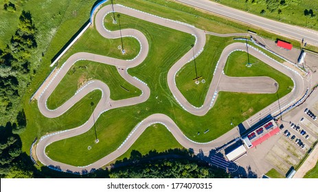 Photo Of A Race Track In Green Colors Taken By Drone, Top View. Russia, Moscow Region.