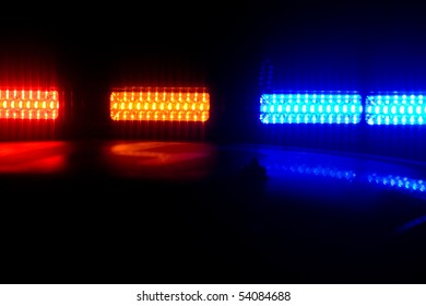 Photo Of Red And Blue LED Police Roof Lights On A Police Cruiser