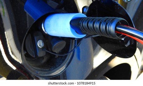 Photo Of Refuel LPG Hose In Car As Seen In Gas Station