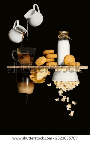 The photo representing of our life. The upside is coffee and biscuits we eat in working time. The down side is popcorn and drink we eat fun and relaxing time. so its called a upsidedown image.