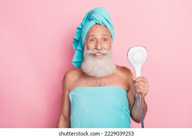 Photo of retired man hold shower head take bath in sauna salon center isolated on pastel color background - Powered by Shutterstock