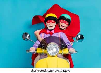 Photo Of Retired Pensioner Grey Haired Couple Wife Husband People Wear Helmet Mask Ride Biker Isolated On Blue Color Background