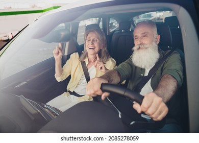 Photo Of Retired Pensioner Grey Haired People Old Couple Ride Car Trip Good Mood Sing Vacation Outside Outdoors In Urban City