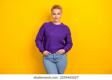 Photo of rich lady blonde short hair put hands pockets jeans wear stylish expensive purple knit trendy jumper isolated on yellow color background - Shutterstock ID 2259463227