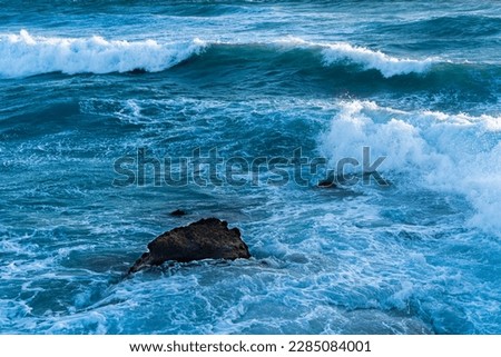 Similar – Image, Stock Photo the surf foams, roars and swells as seen from above