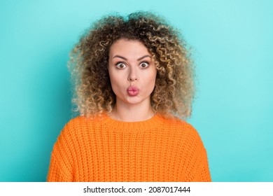 Photo Of Romantic Crazy Girlfriend Pouted Lips Send Air Kiss Wear Orange Knitted Sweater Isolated Teal Color Background