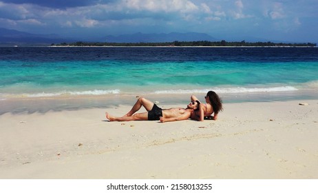 russian pair enjoys at beach &2