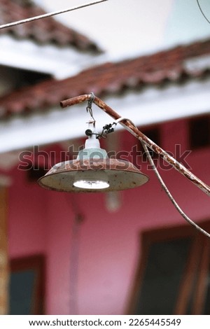 Photo of a Rusty Street Lamp