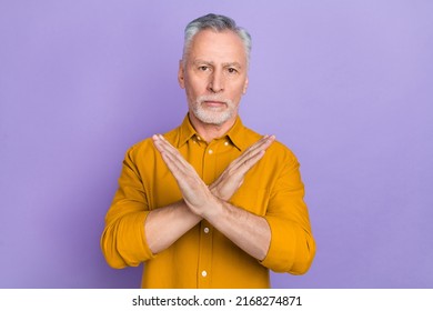 Photo of sad old white hairdo man crossed palms wear mustard shirt isolated on violet color background - Shutterstock ID 2168274871