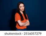 Photo of sad upset gloomy moody woman wear orange clothes folded arms look empty space isolated on dark blue color background