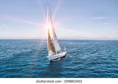 Photo of sailboat sailing on ocean - Shutterstock ID 1908853432