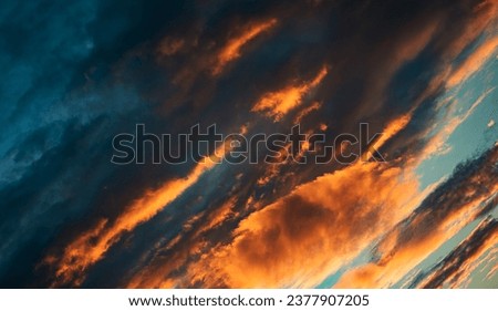 A photo of scattered clouds in the sky. The clouds are wispy and light, and they create a sense of peace and tranquility. The photo is a reminder of the beauty and wonder of nature, 