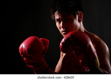 Photo Series of young asian boxer getting ready and stepping into the ring.