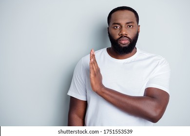 Photo Of Serious Dark Skin African Citizen Guy Community Group Member Say No Violence Behavior Black Lawlessness Raise Arm Empty Space Care Human Life Isolated Grey Color Background