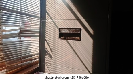 photo of the shadow of the morning light in the wardrobe