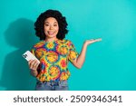 Photo of shiny attractive lady dressed retro t-shirt texting instagram twitter telegram facebook arm empty space isolated blue color background