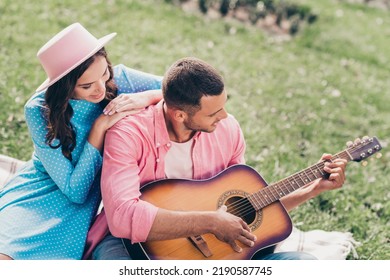 Photo Of Shiny Cute Two People Together Wear Casual Outfits Playing Guitar Sitting Checkered Blanket Outside Garden