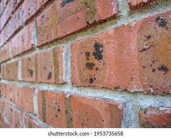 Photo Show A Red Brick Wall Of 1940s House. Selective Focus. 