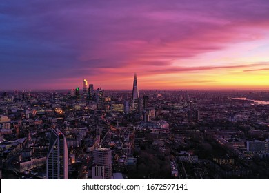 Photo shows beautiful sunrise at London where the sky is in pink and violet color. - Powered by Shutterstock