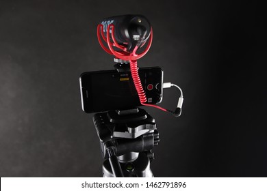 The Photo Shows Microphone Rode VideoMic Go With Smartphone IPhone 7 Which Record A Video.

Częstochowa / Poland - July 2019