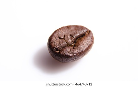 Photo Of A Single Coffee Grain Isolated On A White Background