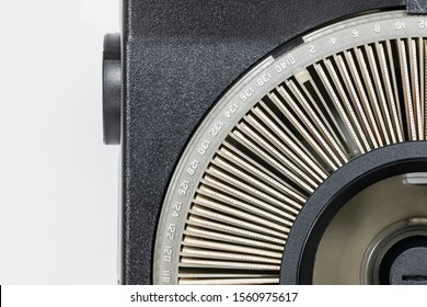 Photo Slides And Old Projector With Round Tray With White Background. 